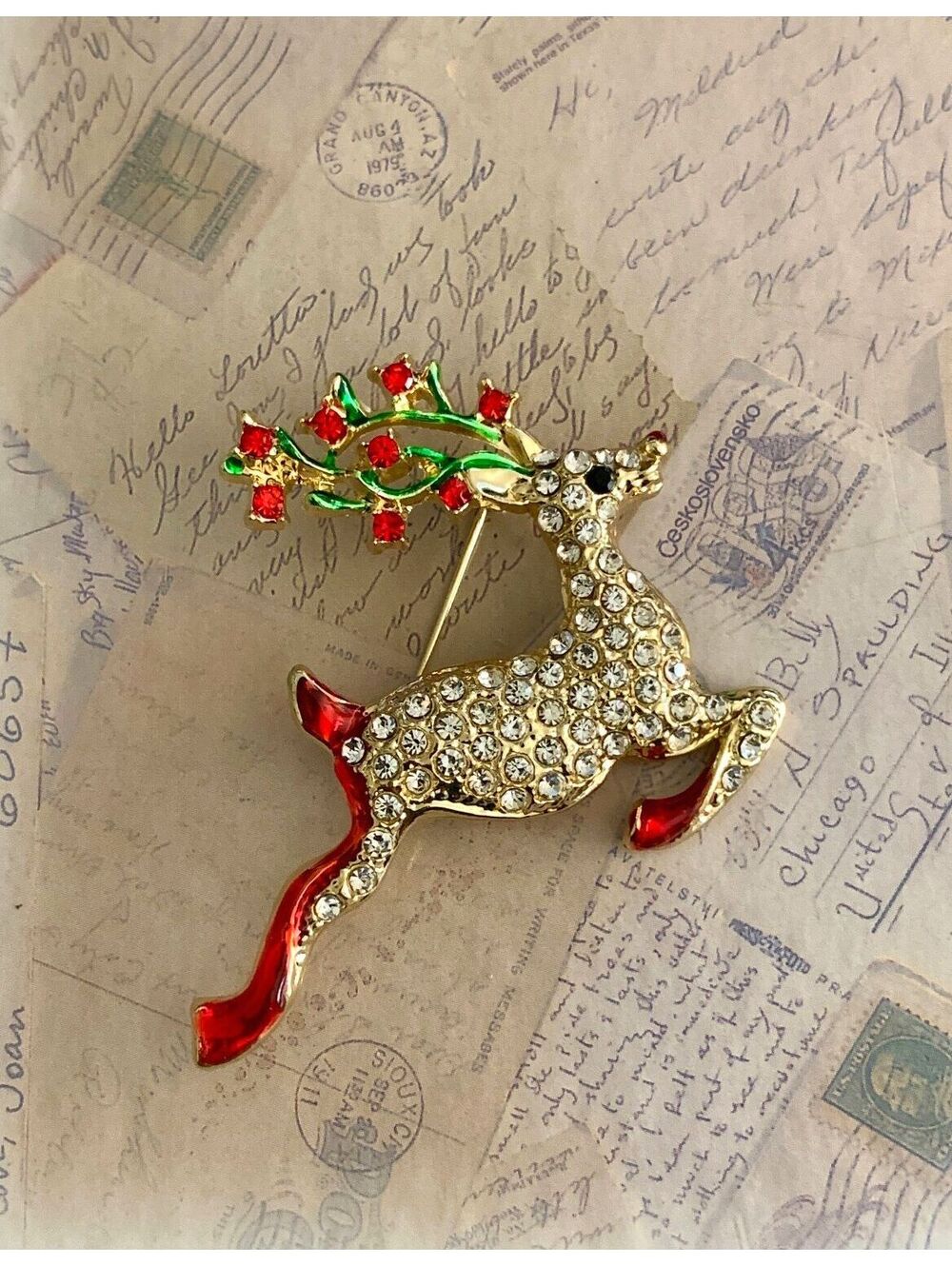Sparkling Holiday Reindeer Brooch with Red & Green Rhinestones